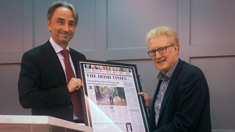 Former Irish Times editor Paul O’Neill presenting Michael O’Regan with a special front page to mark his retirement from the newspaper after almost 40 years