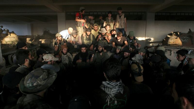 Rebel fighters gather in an artillery academy of Aleppo, Syria, August 6, 2016. Photograph: Reuters