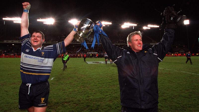 Leinster captain Reggie Corrigan and coach Matt Williams with the Celtic League  trophy after the win over Munster in the 2001 final at Lansdowne Road. Photograph: Billy Stickland/Inpho