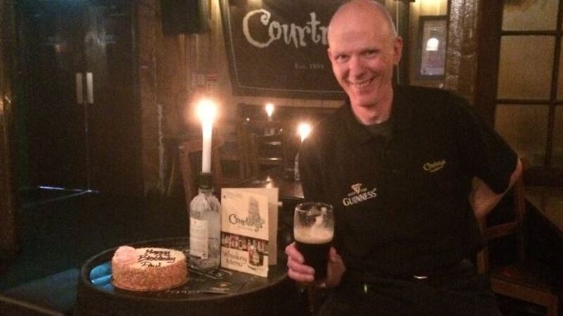Brian Murphy, manager at Courtney’s in Killarney, with their ‘Happy Birthday Paul’ cake.