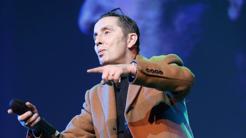 Christy Dignam on the main stage at the Pendulum Summit, a ‘business, leadership and self-empowerment conference’ at Dublin’s Conference Centre. Photograph: Conor McCabe