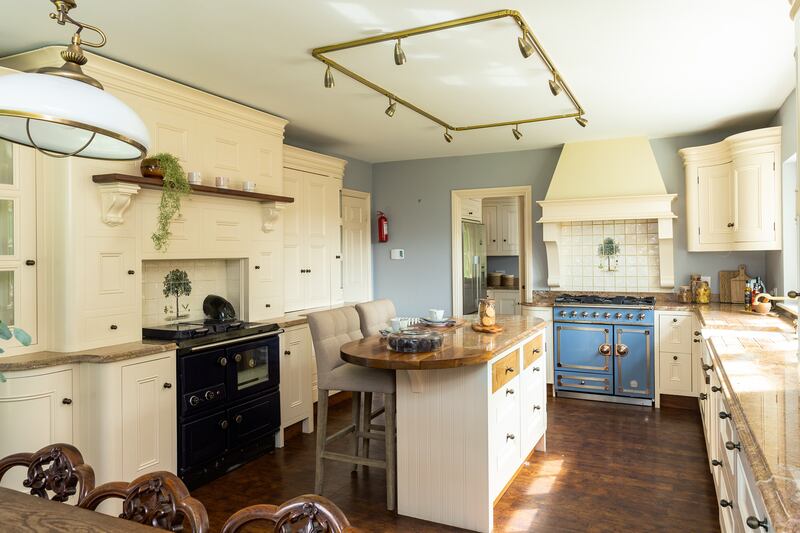 The kitchen has a La Cornue stove