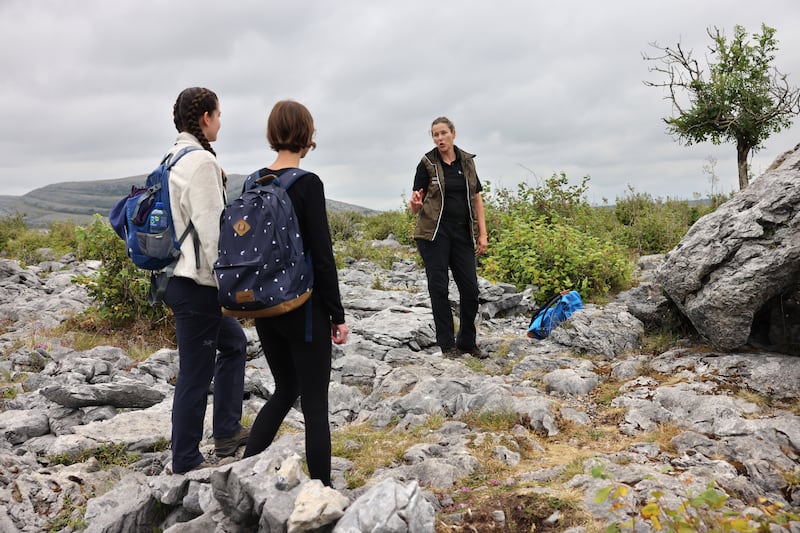 Phoebe Larkin, head guide, the Burren National Park, with Melanie Bucher and Michelle Suppiger, both from Lucerne, Switzerland.
Photograph: Dara Mac Dónaill