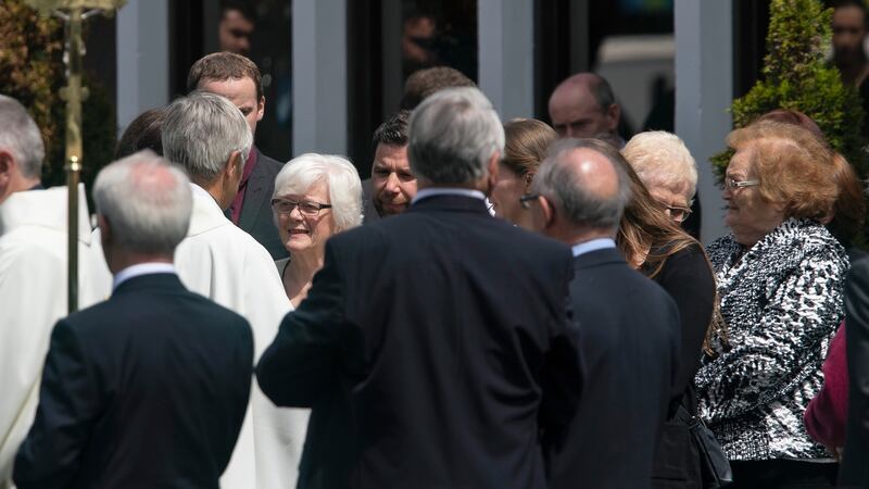 Mourners are consoled  after the funeral of James Price who died in a light aircraft crash  last Friday. His funeral took place at St John the Evangelist Church, Ballinteer this afternoon. Picture Colin Keegan, Collins Dublin