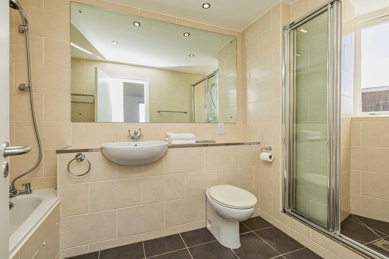 En suite with bath and shower