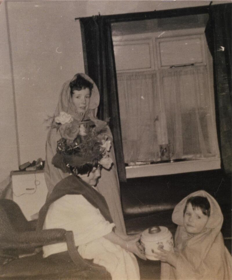 Martina Evans with her sisters, as a child, at Christmas