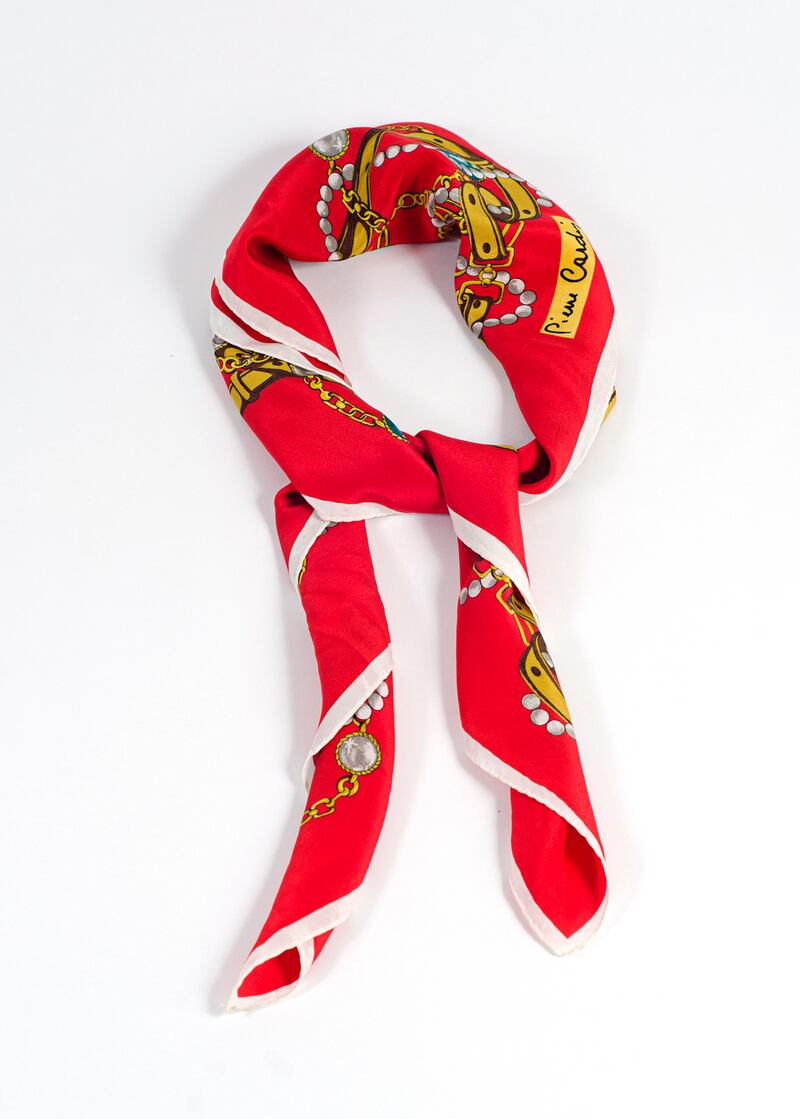 Red and gold vintage Pierre Cardin silk scarf with hand rolled edges €35 from Om Diva, Drury Street, Dublin
