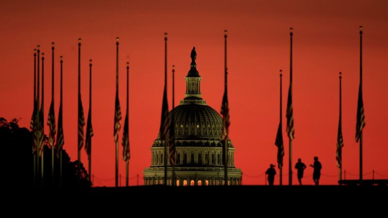 Mandalay Bay shooting: flags fly at half-mast in front of the US Capitol Building, in Washington.  Photograph: Manuel Balce Ceneta/AP Photo