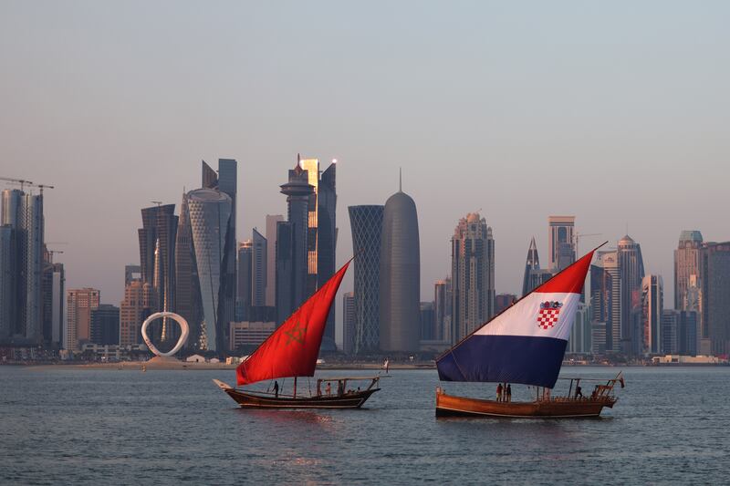 Boats with sails bearing the Moroccan and Croatian national flags in front of the Doha skyline: Morocco and Croatia will contest the 2022 World Cup third-place play-off on Saturday. Photograph: Alex Pantling/Getty Images