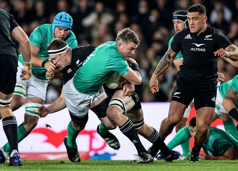 Ireland's Peter O'Mahony is tackled by Brodie Retallick of New Zealand during the first Test in Auckland. Photograph: Billy Stickland/Inpho