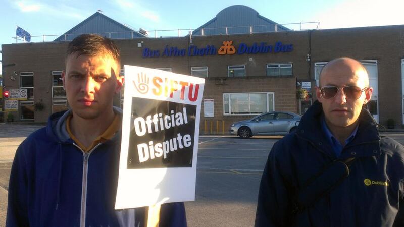 Dublin Bus drivers picket the Clontarf bus depot this morning.