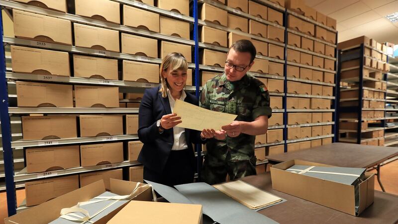 Senior archivist Cécile Gordon, project manager of the Military Service Pensions Collection, and Capt Daniel Ayiotis in the Military Archives at Cathal Brugha Barracks, Dublin. Photograph: Colin Keegan, Collins