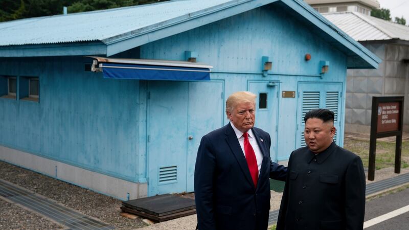 US president Donald Trump and North Korean leader Kim Jong-un stand on the South Korean side of the Demilitarized Zone between North and South Korea in June.  Photograph: Erin Schaff/New York Times