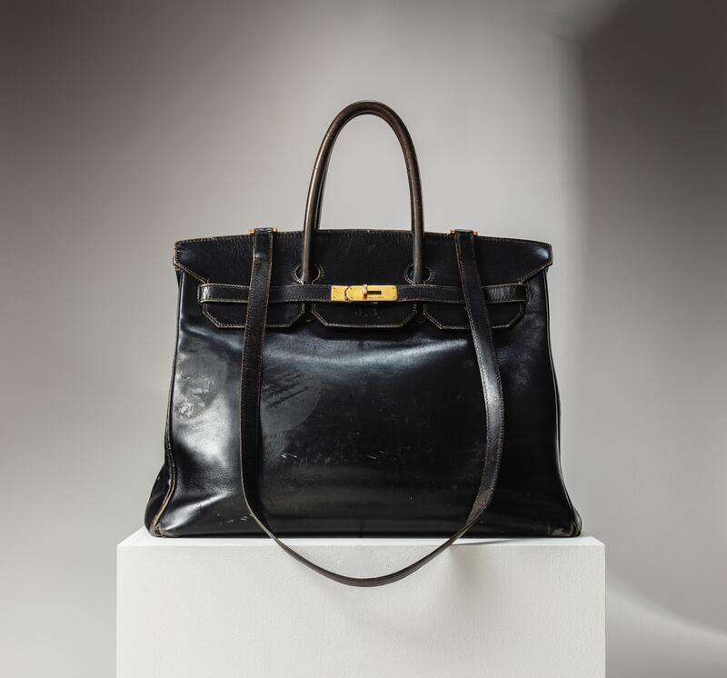 The original Hermes Birkin Bag, owned by Jane Birkin, was sold at the Sotheby's Fashion Icons Auction in Paris. Photograph: Sotheby's/PA