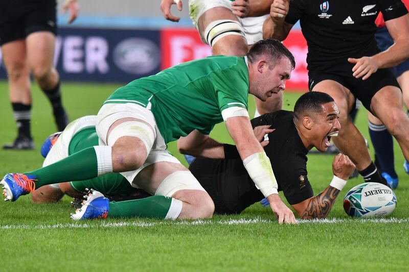 New Zealand's scrumhalf Aaron Smith scores his first try. Photo: Getty Images
