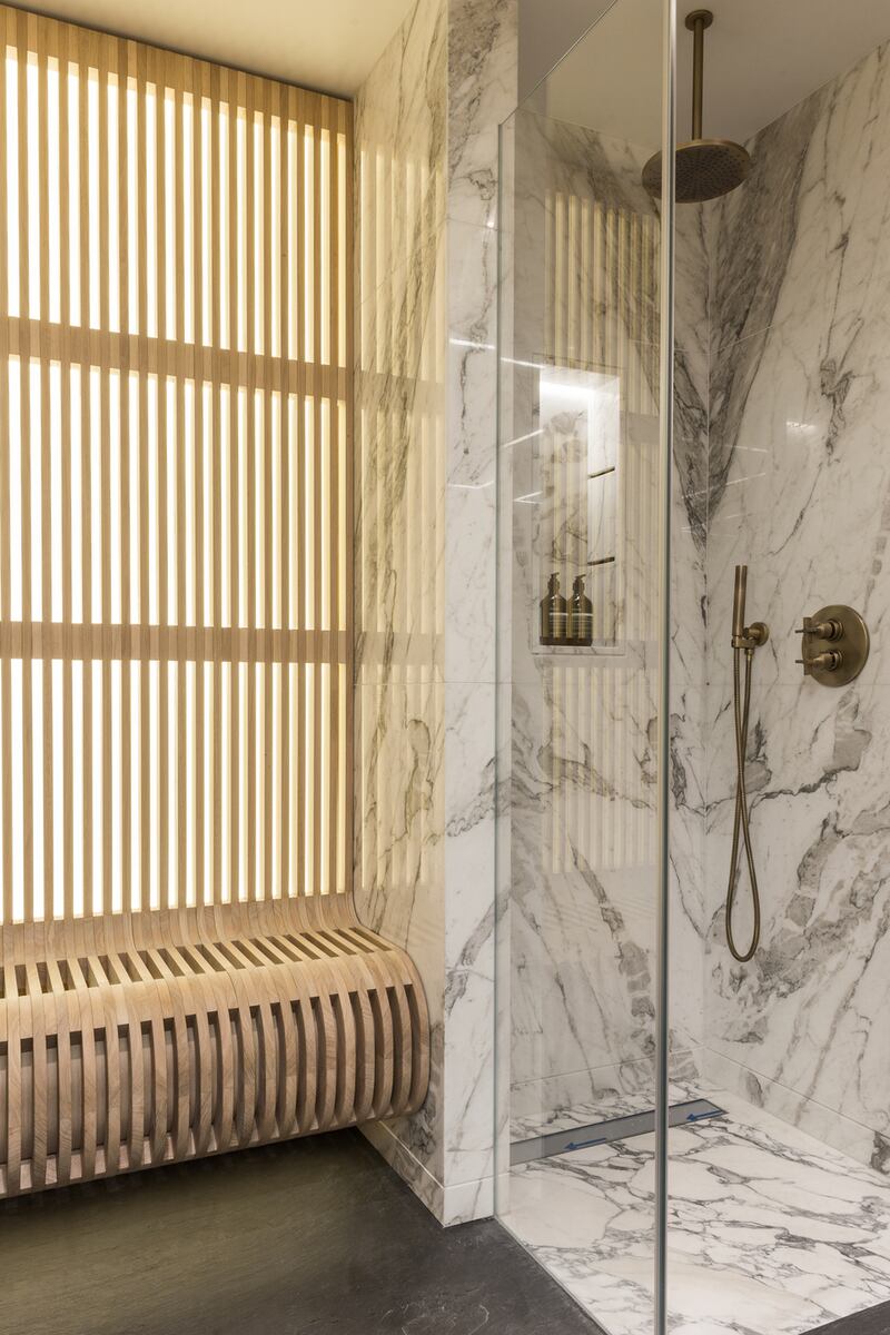 This shower room in a Relton mews house in London has looked east to Japan for window treatment