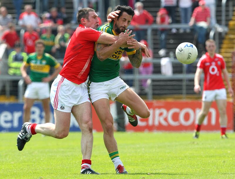 Cork's Noel O'Leary and Paul Galvin of Kerry during the 2012 Munster semi-final. Photograph: Lorraine O'Sullivan/Inpho