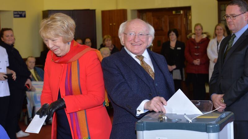 President Michael D Higgins and his wife Sabina casting their votes  St Mary’s Hospital, Phoenix Park. Photograph: Alan Betson