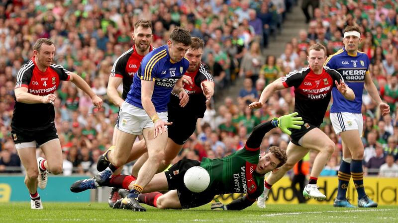 Mayo goalkeeper David Clarke attempts to block Kerry’s Paul Geaney during the All-Ireland semi-final replay at Croke Park. Photograph: James Crombie/Inpho