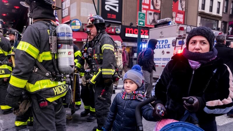 After a man in a homemade suicide vest blew himself up near Times Square on Monday, New Yorkers kept their fears at bay and the subway turnstiles spinning. Photograph: Christian Hansen/The New York Times