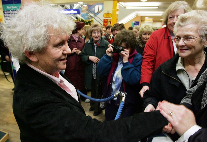 Nell McCafferty in Easons Dublin is congratulated by members of the public during her book signing in 2004 Photograph: Leon Farrell//RollingNews.ie