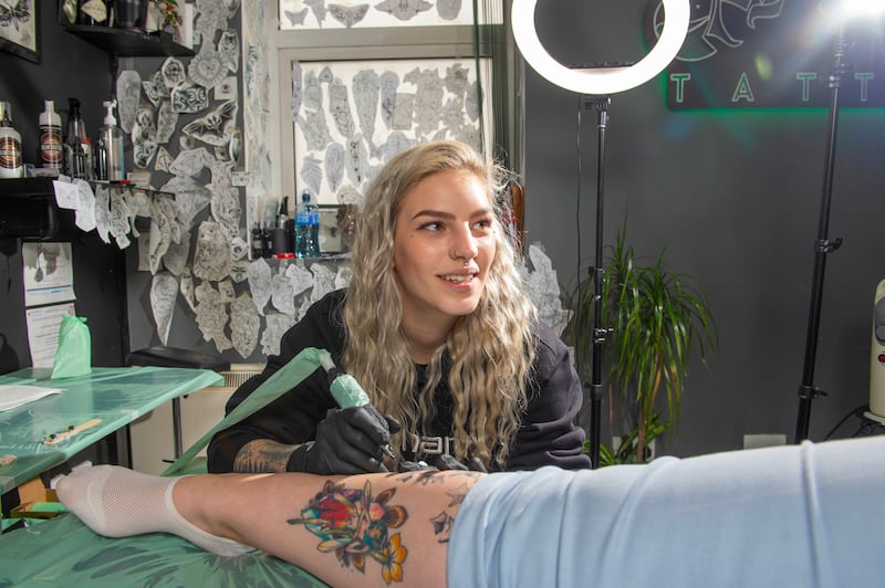 Tattoo artist Lucia Dzurkova at Art Lab Studios in Cork: 'We want to make sure our customers are not only happy with their new tattoo but also the overall experience.' Photograph: Michael Mac Sweeney/Provision
