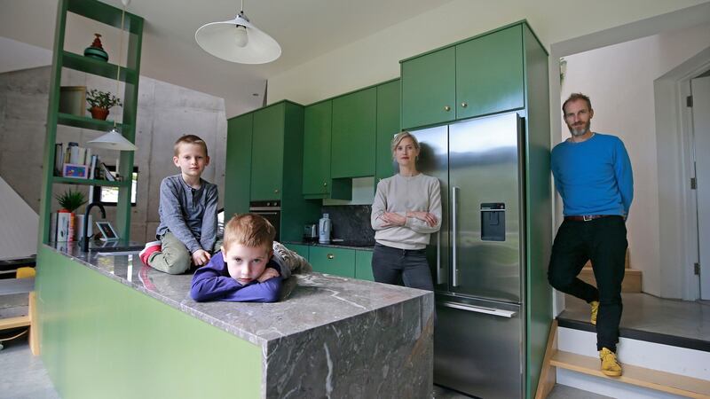 Bert (8) and Ted (5) with their parents Jenny Belton and Enda Loughman. Photograph: Nick Bradshaw/The Irish Times
