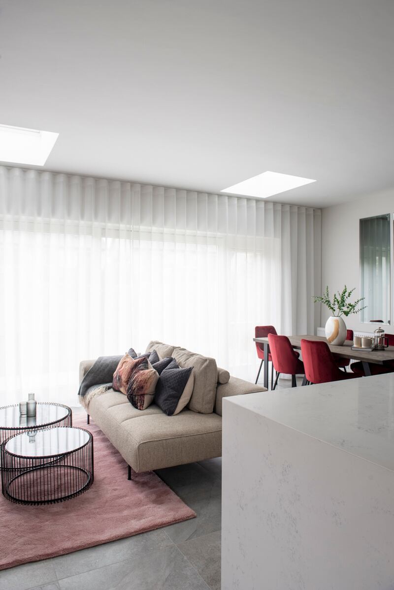 Sheer fabrics such as voile are ideal for privacy without sacrificing natural light. Livingroom by Optimise Design