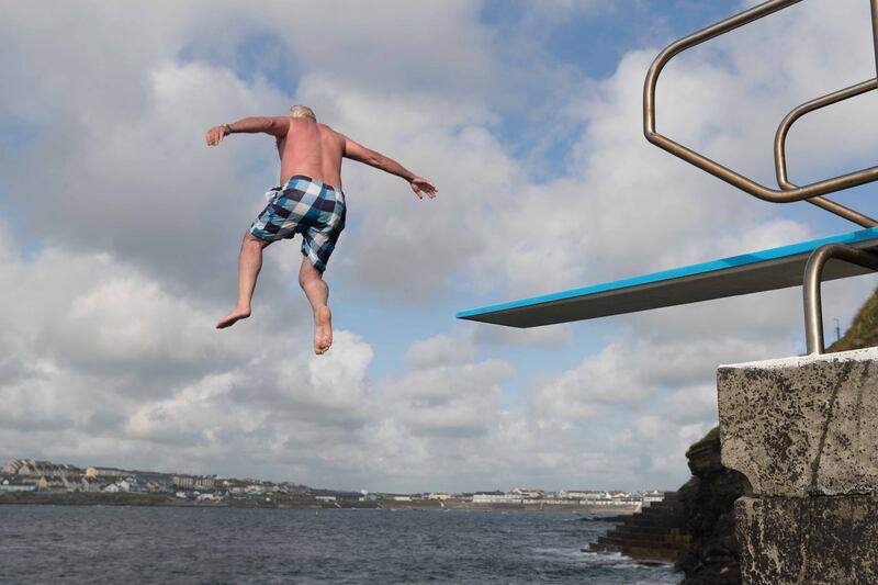 Keeping cool on a warm summer day at Kilkee, Co Clare. Photograph: Eamon Ward