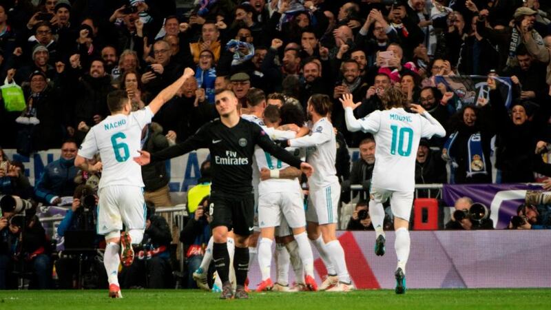 Real Madrid players after Marcelo gives them a 3-1 lead against PSG. Photograph: Curto De La Torre/AFP