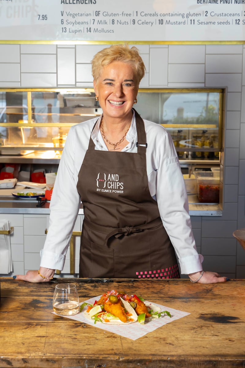 Eunice Power at her fish and chip shop {…} And Chips, in Dungarvan. Photograph: Patrick Browne