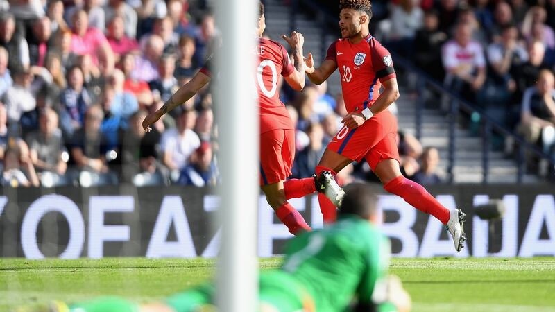 Alex Oxlade-Chamberlain of England celebrates his goal. Photograph:  Mike Hewitt/Getty Images