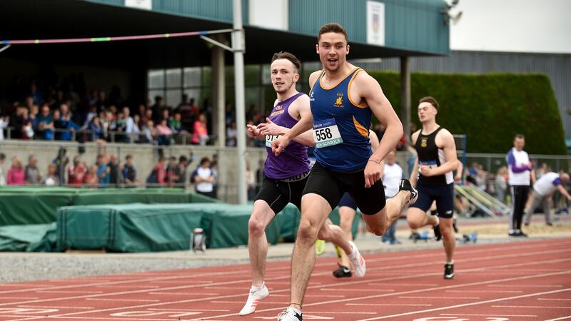 Aaron Sexton (R) of Bangor Grammar beats  David McDonald of CBS Wexford in the 200m. Photograph: Sam Barnes/Sportsfile