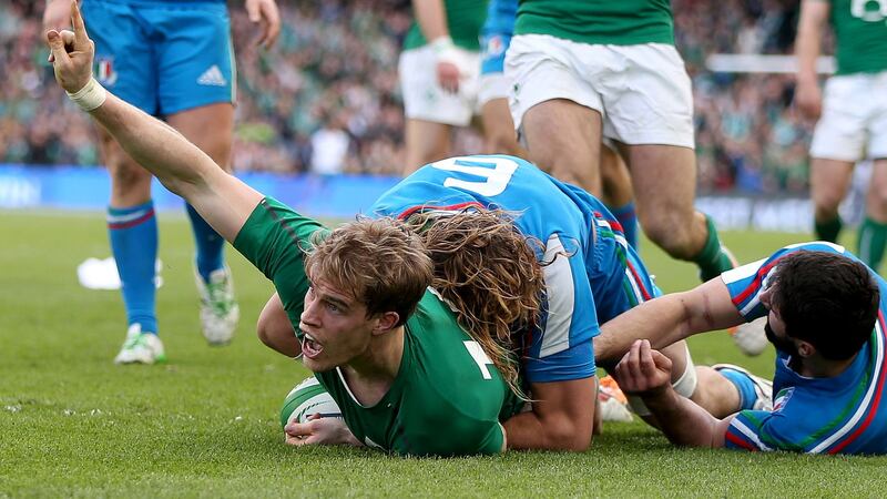 Andrew Trimble goes over for a  try.
