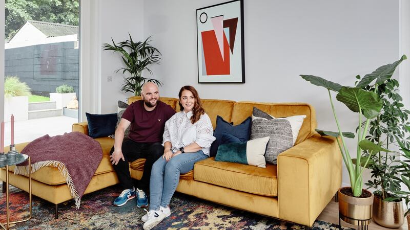 Anna McCoy and David Verdon on the couch.