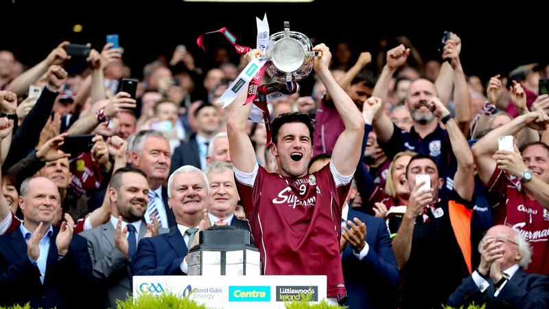Galway captain David Burke lifts the Liam MacCarthy Cup. Photograph: Ryan Byrne/Inpho