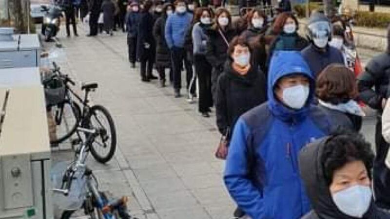 People queue for masks in Daegu