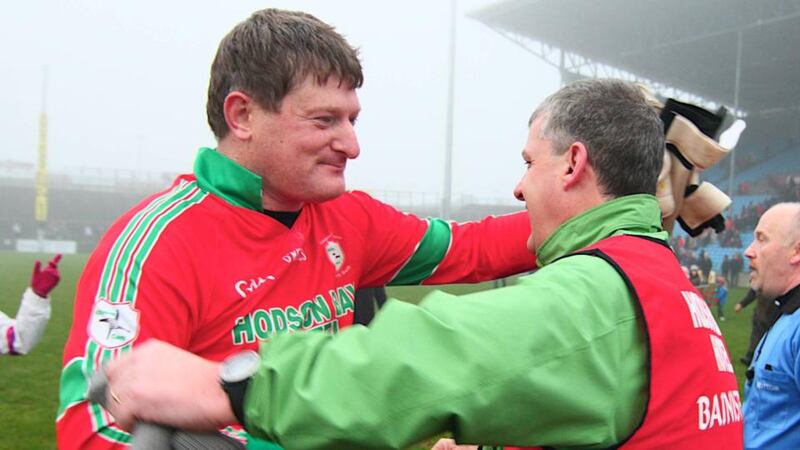 St Brigid’s goalkeeper Shane Curran and manager Kevin McStay celebrate in 2013. Photograph: Mike Shaughnessy/Inpho