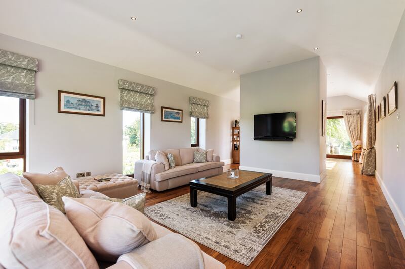 First floor living room with views over golf course