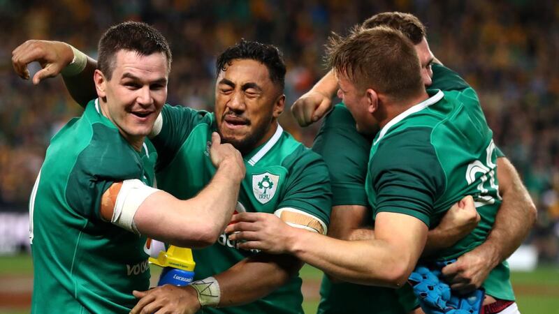 Johnny Sexton celebrates with his teammates after sealing a series win over Australia in 2018. Photograph: Cameron Spencer/Getty