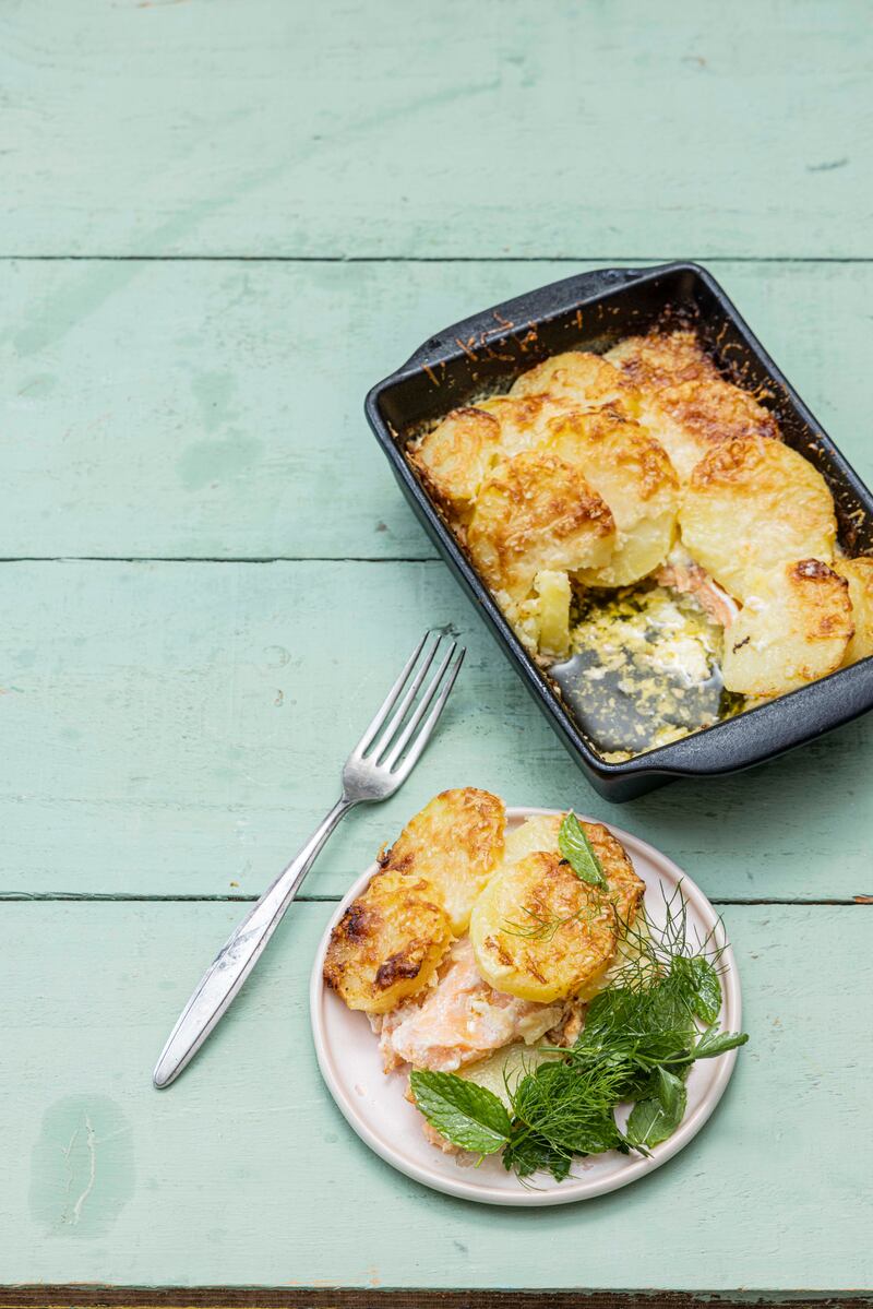 Smoked salmon and creamed potato bake with herb salad