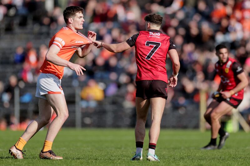 Tempers flare during the game between Down's Shealan Johnston and Jarly Og Burns of Armagh. Photograph: Laszlo Geczo/Inpho