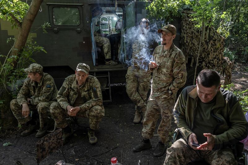 An artillery unit from the 17th Tank Brigade in Ukraine’s eastern Donetsk region. Photograph: Finbarr O'Reilly/New York Times
                      