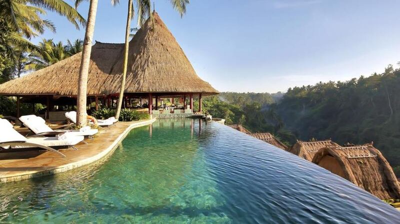 The pool and restaurant at the Viceroy Bali