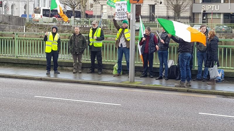 First of a group protesting against proposed hate laws start gathering outside Cork City Hall Photograph: Barry Roche
