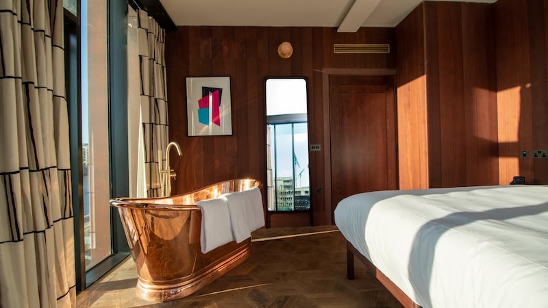Suites have copper baths in the bedroom.