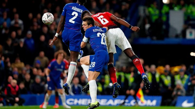 Paul Pogba leaps to score Manchester United’s second in their win over Chelsea. Photograph: Adrian Dennis/AFP/Getty