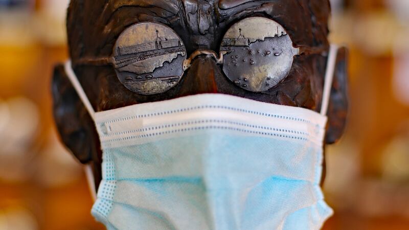 A statue of James Joyce with a Covid-19 face mask at 64 Wine in Glasthule, Dublin, to celebrate Bloomsday. Photograph: Niall Carson/PA Wire