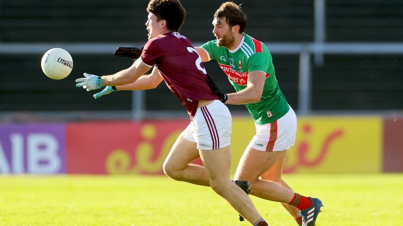 Galway’s Sean Kelly dragged Aidan O'Shea out of the Mayo forward line in the Connacht final by constant attacking. The Mayo forwards will track, every time. Photograph: Inpho