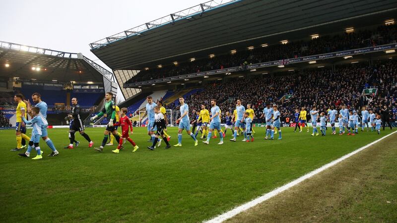 Birmingham City fans in the away end at St Andrew’s ahead of their side’s draw with Coventry. Photograph: Marc Atkins/Getty